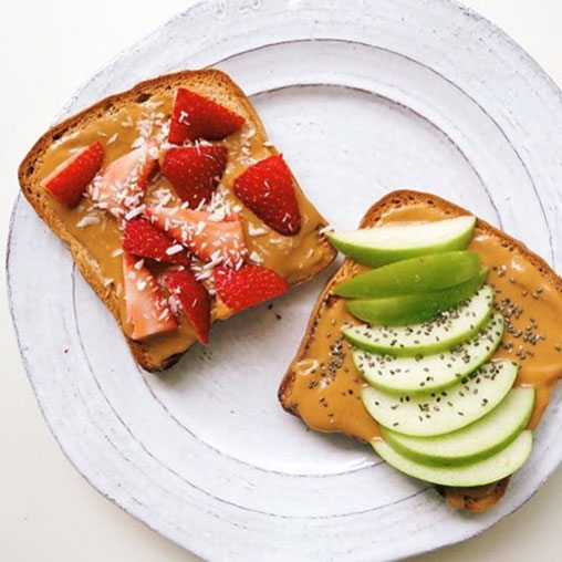 Wowbutter toast with green apple and strawberries