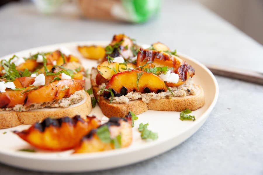 vegan gluten free ricotta toast with grilled peaches and mint